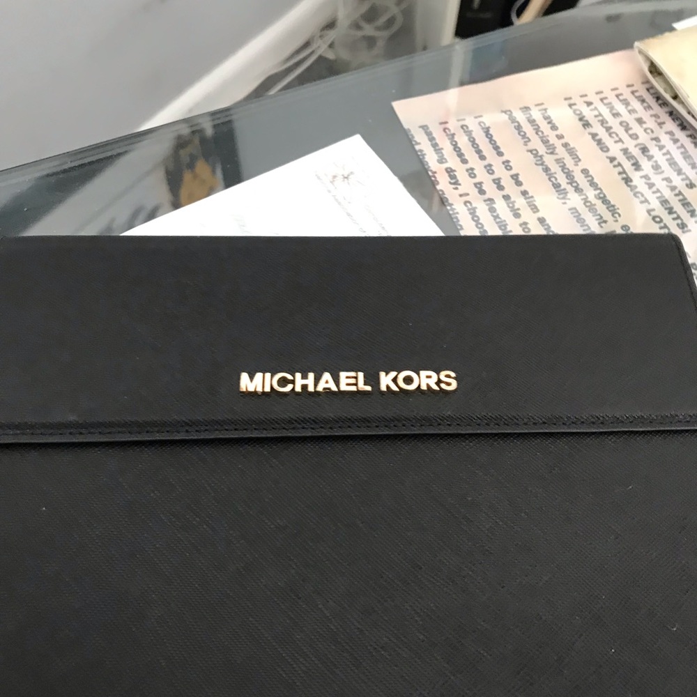 Brand new Michael Kors mini ipad case.